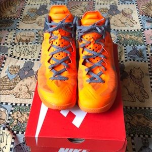 Orange Nike basketball shoes
